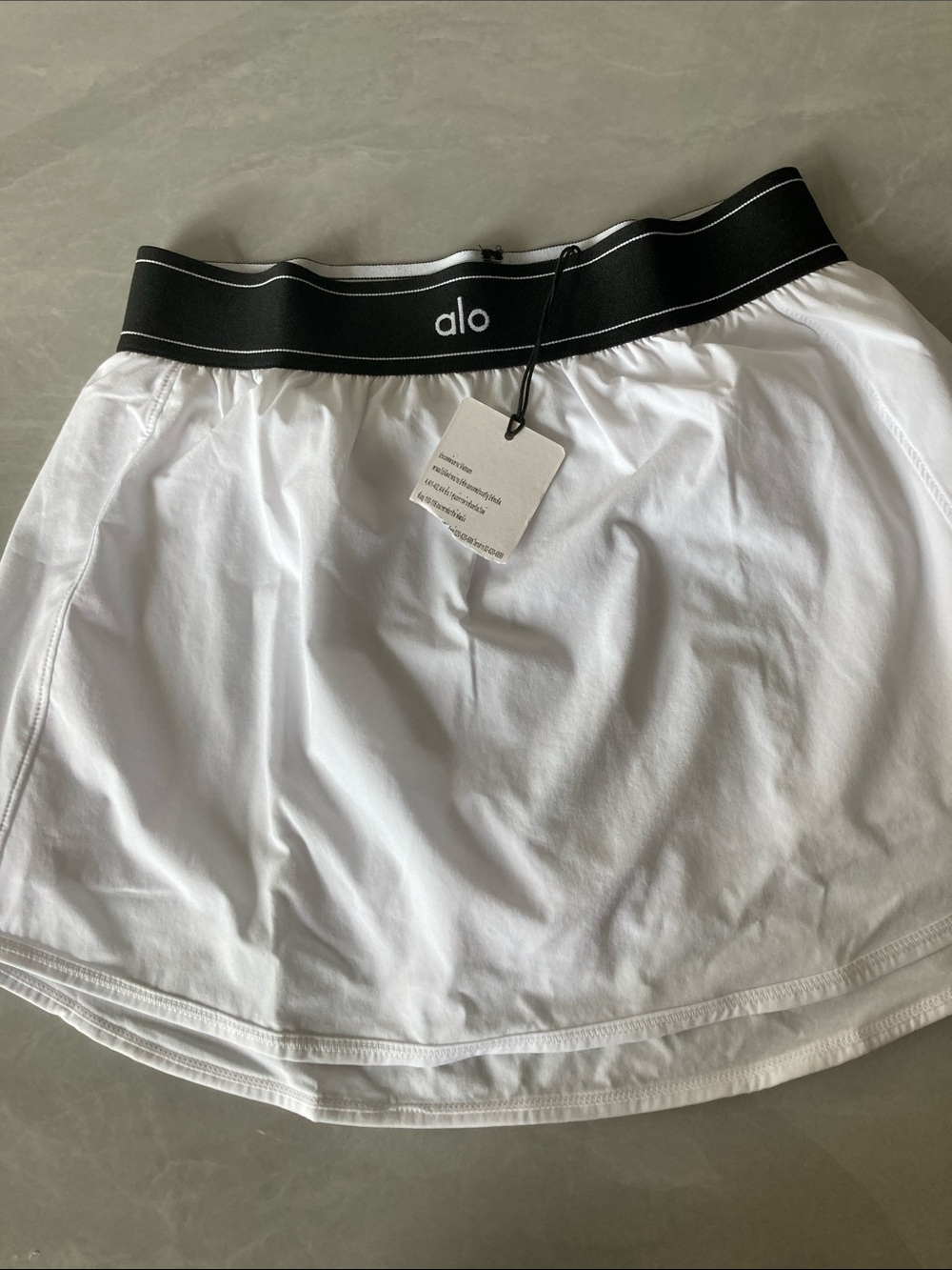 ALO Yoga White Skort with Black Logo Waistband
